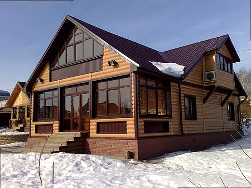 Отделка фасада материалами под дерево